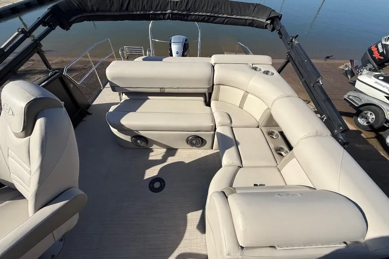 Slide: The Image of 2019 Harris CRUIZER 230 SALT EDITION pontoon boat with luxurious seating and modern design. - 85
