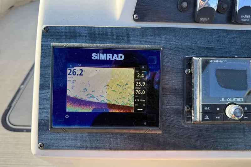 Slide: The Image of Simrad display on 2019 Harris CRUIZER 230 SALT EDITION boat dashboard. - 97