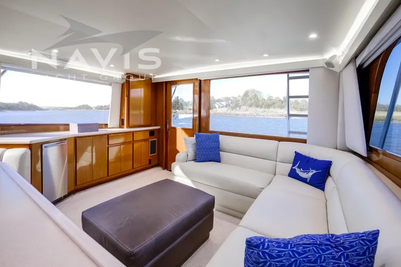 Slide: The Image of Cockpit view of 1998 Viking 58 Convertible yacht with navigation screens and steering wheel. - 28