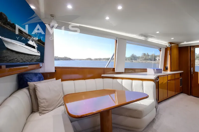 Slide: The Image of Interior view of 1998 Viking 58 Convertible yacht cockpit with navigation screens. - 29