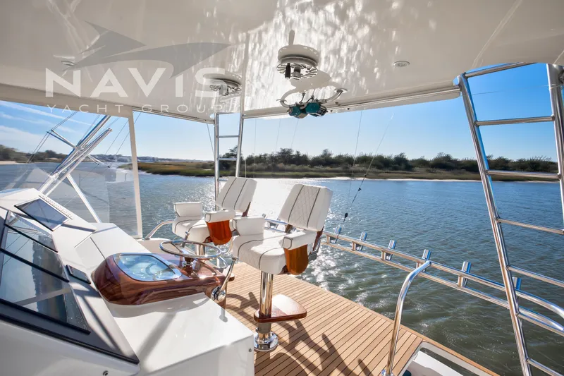 Slide: The Image of Aerial view of 1998 Viking 58 Convertible yacht on water. - 36