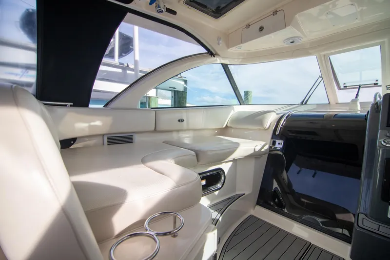 Slide: The Image of Interior of 2013 Pursuit OS 345 Offshore boat with luxurious seating and modern design. - 23