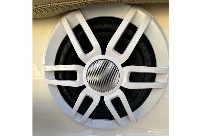 Slide: The Image of White speaker grille on 2025 Scout 195 Sport Dorado boat. - 19