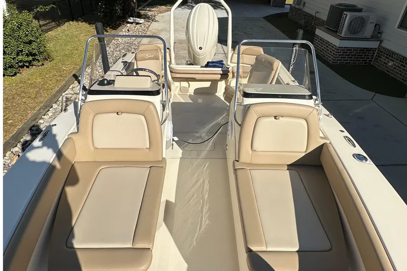 Slide: The Image of 2025 Scout 195 Sport Dorado boat interior with beige seating and modern design. - 24