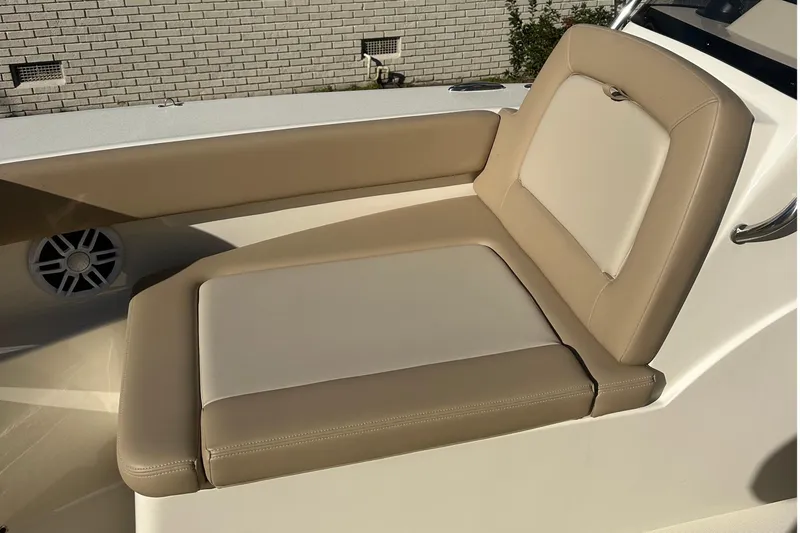 Slide: The Image of 2025 Scout 195 Sport Dorado boat seat with beige and cream upholstery. - 26