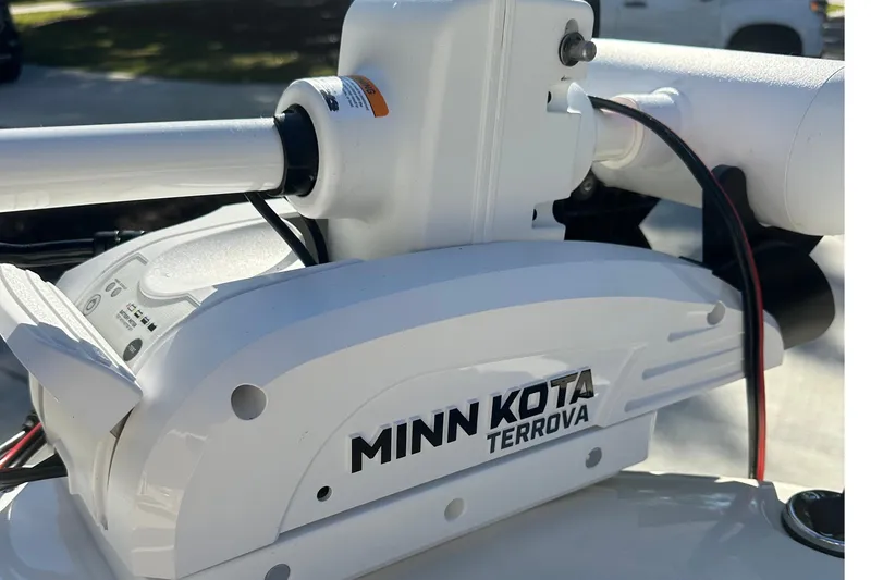 Slide: The Image of 2025 Scout 195 Sport Dorado with Minn Kota Terrova trolling motor, close-up view. - 8