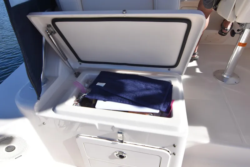 Slide: The Image of Open storage compartment on 2017 Grady-White Express 330 boat deck. - 14