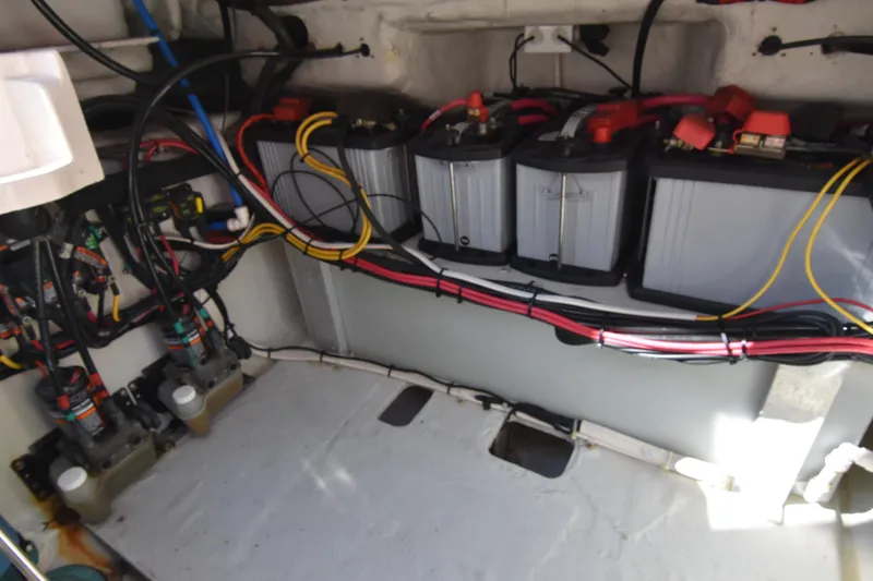 Slide: The Image of Electrical system of a 2017 Grady-White Express 330 boat, featuring batteries and wiring. - 20