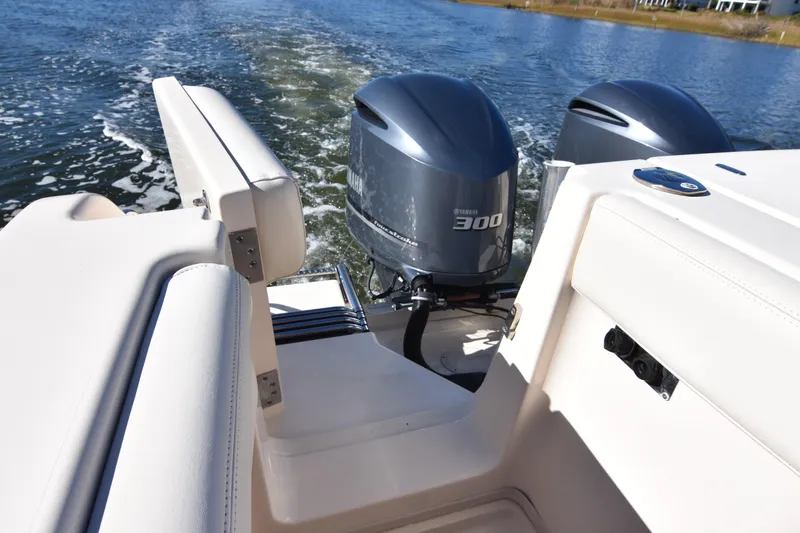 Slide: The Image of 2017 Grady-White Express 330 boat with twin Yamaha 300 engines on water. - 33