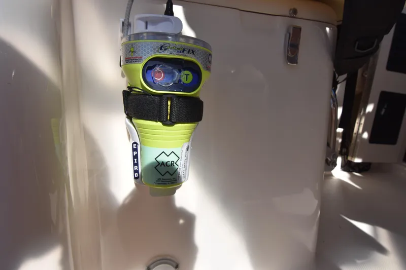 Slide: The Image of EPIRB device on 2017 Grady-White Express 330 boat for emergency signaling. - 36