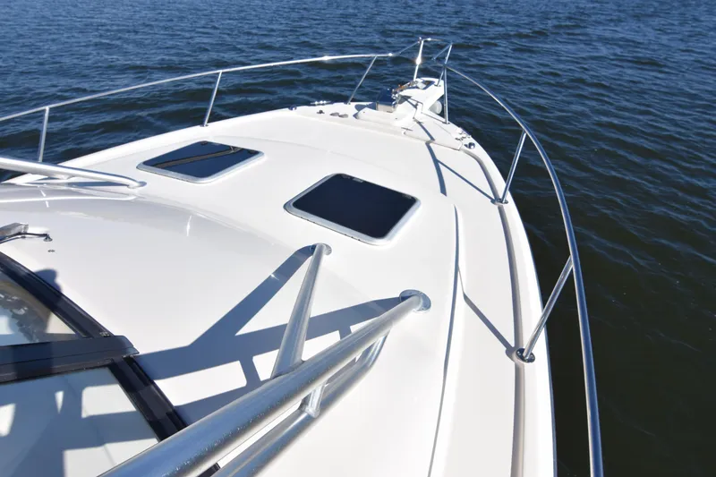 Slide: The Image of 2017 Grady-White Express 330 boat deck on calm water. - 39