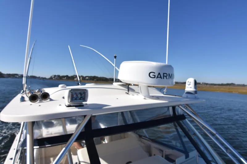 Slide: The Image of 2017 Grady-White Express 330 boat with Garmin radar on open water. - 41