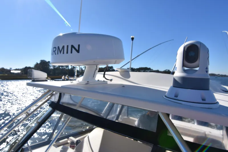 Slide: The Image of 2017 Grady-White Express 330 boat with Garmin radar and camera on deck. - 42