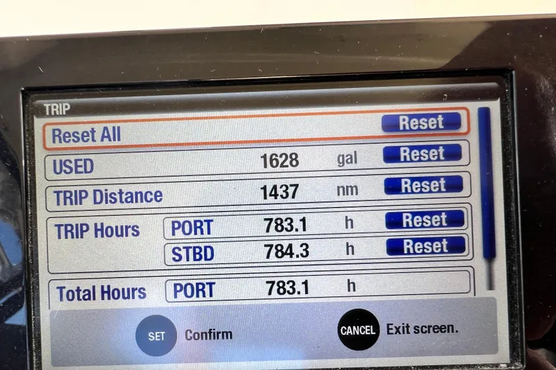 Slide: The Image of Display screen of 2017 Grady-White Express 330 showing trip data and reset options. - 6