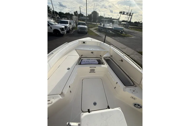 Slide: The Image of 2026 Skeeter SX2550 Family boat interior with open storage compartments. - 7