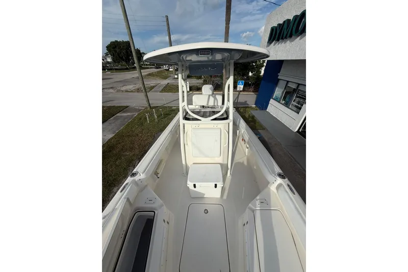 Slide: The Image of 2026 Skeeter SX2550 Family boat interior with center console and seating. - 9