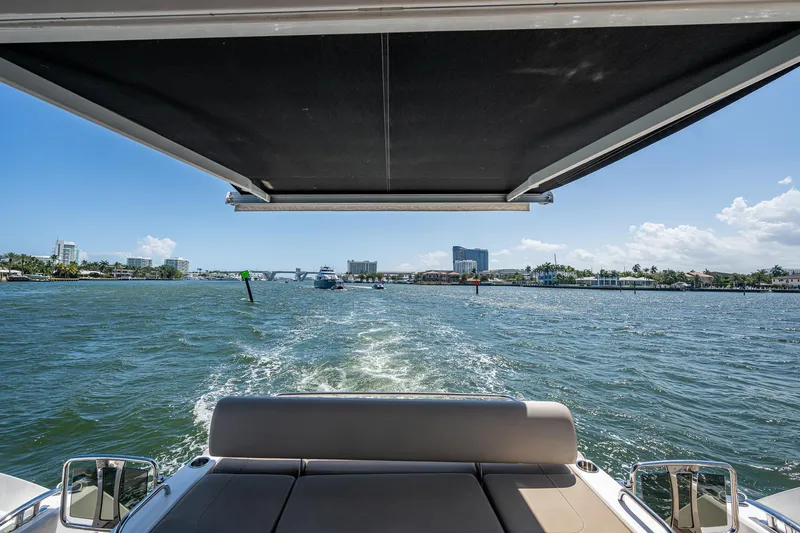 Slide: The Image of 2019 Sunseeker Predator 50 yacht cruising on a sunny day, view from the deck. - 21
