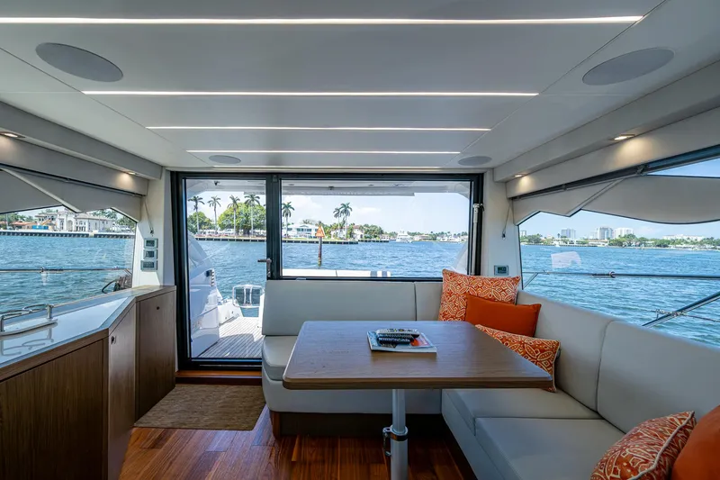 Slide: The Image of Interior of 2019 Sunseeker Predator 50 yacht with waterfront view and modern seating area. - 30