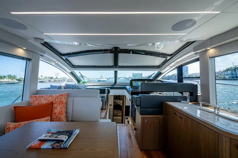 Slide: The Image of Luxurious interior of 2019 Sunseeker Predator 50 yacht with modern design and panoramic windows. - 32