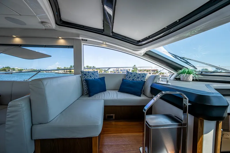 Slide: The Image of Luxurious interior of 2019 Sunseeker Predator 50 yacht with elegant seating and scenic view. - 33