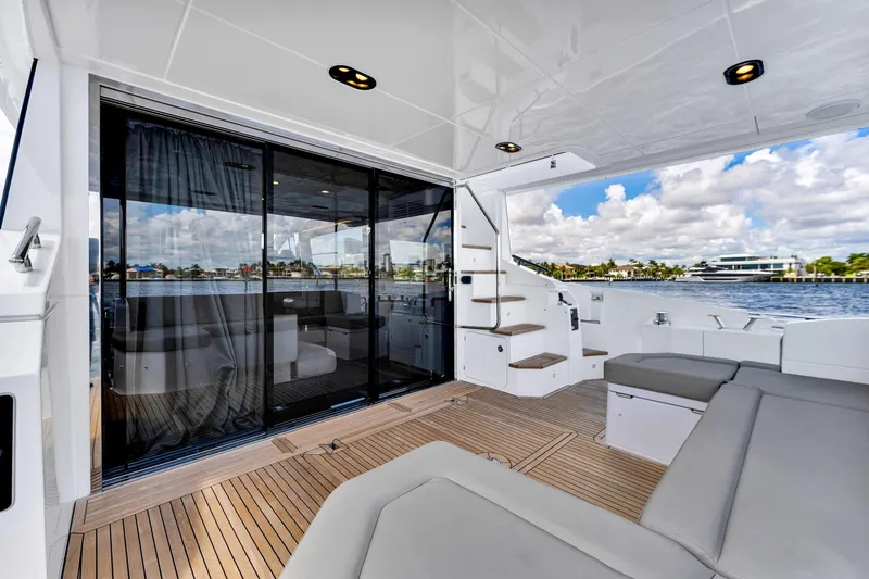 Slide: The Image of Luxurious 2022 Azimut Fly 60 yacht interior with modern design and waterfront view. - 26
