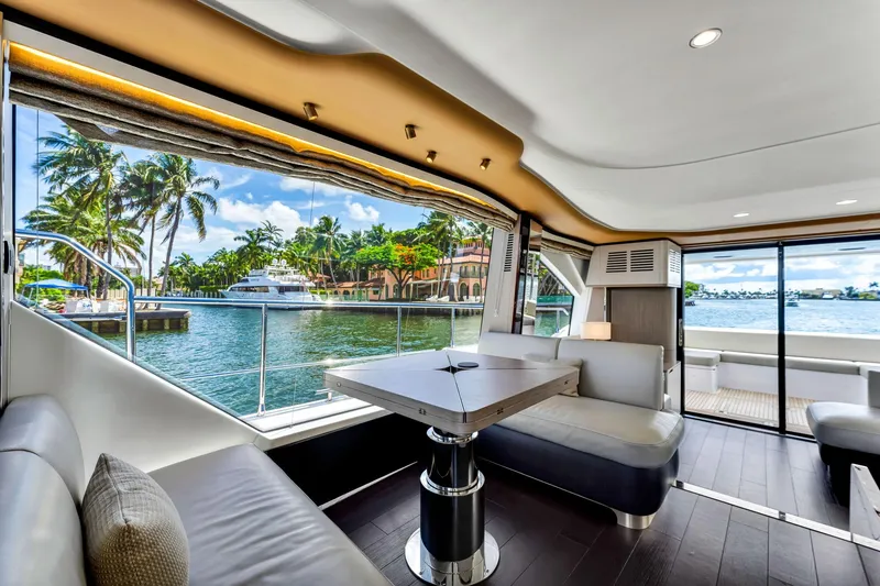Slide: The Image of Luxurious interior of 2022 Azimut Fly 60 yacht with waterfront view and modern seating. - 33