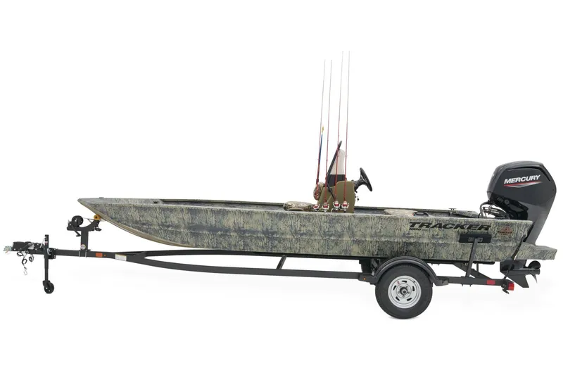 Slide: The Image of 2026 Tracker Grizzly 1860 CC boat with Mercury engine on trailer, outdoors. - 4