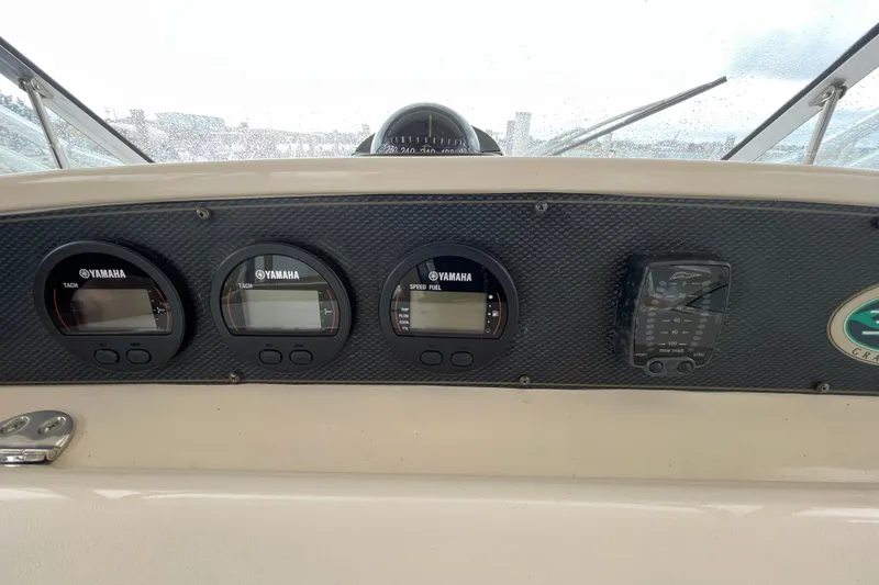 Slide: The Image of Dashboard of 2007 Grady-White Express 330 with Yamaha gauges and controls. - 14