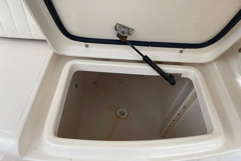 Slide: The Image of Open storage compartment on 2007 Grady-White Express 330 boat. - 44
