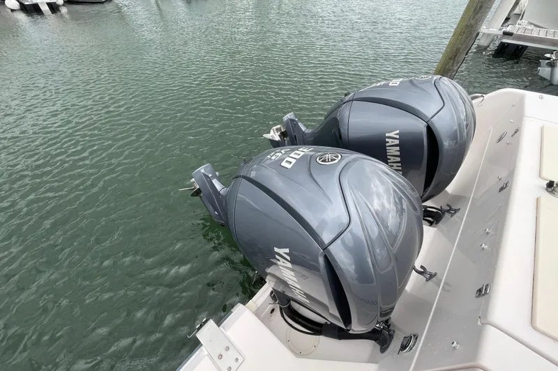 Slide: The Image of Twin Yamaha 300 engines on a 2007 Grady-White Express 330 boat. - 50