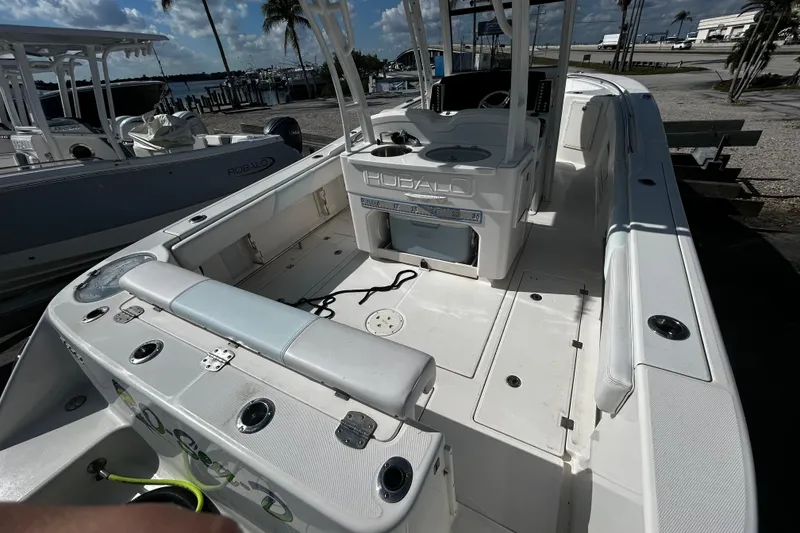 Slide: The Image of 2018 Robalo R302 Center Console boat with spacious deck and seating. - 10