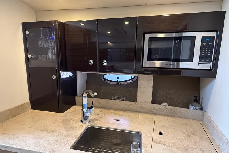 Slide: The Image of Luxurious interior of 2015 Formula 37 Performance Cruiser with white seating and modern design. - 14