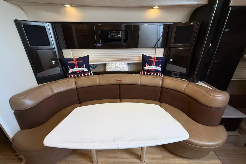 Slide: The Image of 2015 Formula 37 Performance Cruiser interior with sink, seating, and speaker. - 16