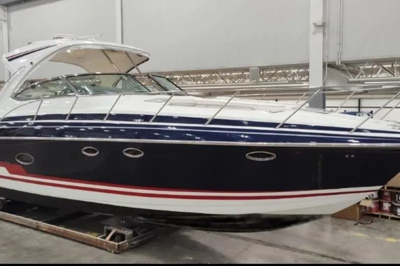 Slide: The Image of 2015 Formula 37 Performance Cruiser in a showroom, showcasing sleek design and luxury features. - 38