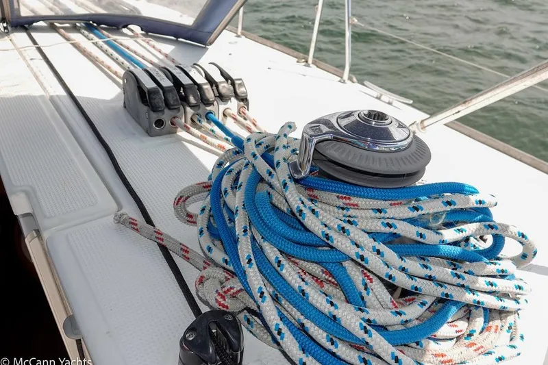 Slide: The Image of Deck of 2005 Beneteau First 44.7 sailboat with ropes and winch. - 18