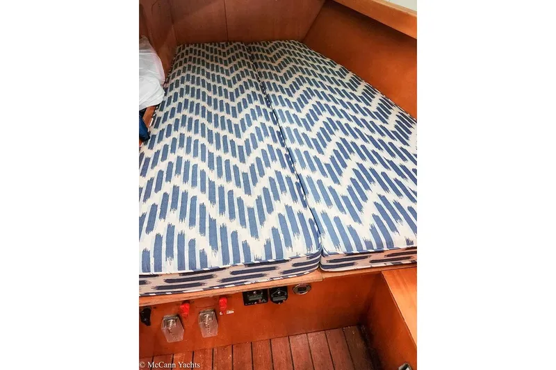 Slide: The Image of Interior cabin of 2005 Beneteau First 44.7 yacht with patterned cushions. - 29