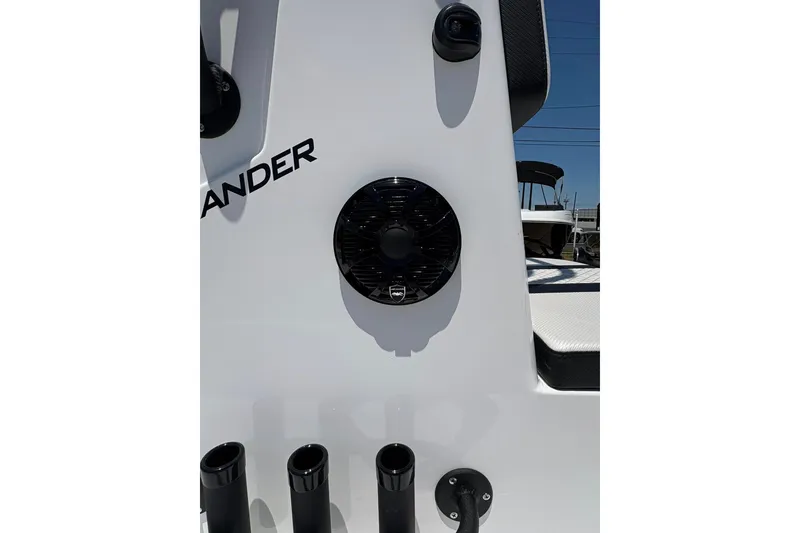 Slide: The Image of Close-up of 2026 Freedom Boats 21' Commander, featuring speaker and rod holders. - 12