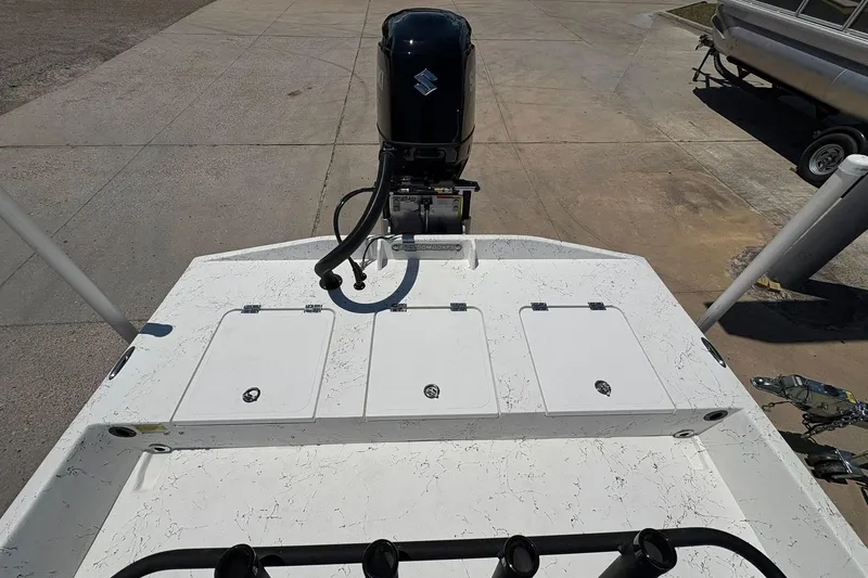 Slide: The Image of 2026 Freedom Boats 21' Commander with Suzuki outboard motor, viewed from above. - 3