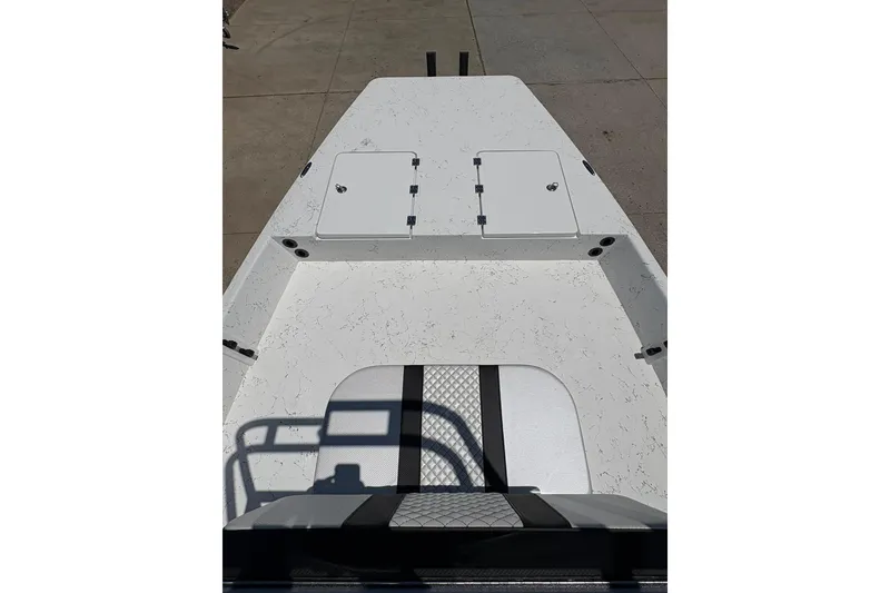 Slide: The Image of 2026 Freedom Boats 21' Commander deck view with storage compartments. - 5