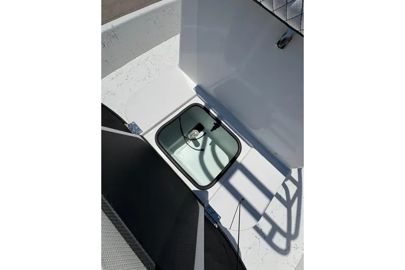Slide: The Image of 2026 Freedom Boats 21' Commander livewell interior view. - 23