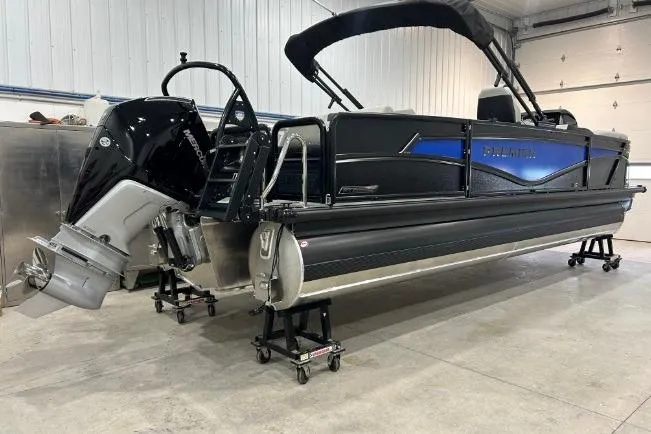 The Image of 2026 Premier 230 Intrigue GT RLO pontoon boat in a garage setting. - 0
