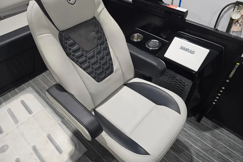 Slide: The Image of 2026 Premier 230 Intrigue GT RLO pontoon boat interior with modern seating and sleek design. - 12