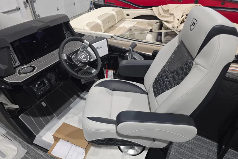 Slide: The Image of Interior detail of 2026 Premier 230 Intrigue GT RLO, featuring control panel and ventilation grille. - 14