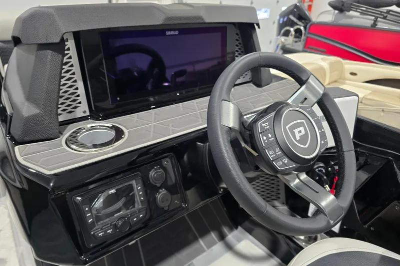 Slide: The Image of 2026 Premier 230 Intrigue GT RLO boat interior with luxurious seating and modern design. - 15