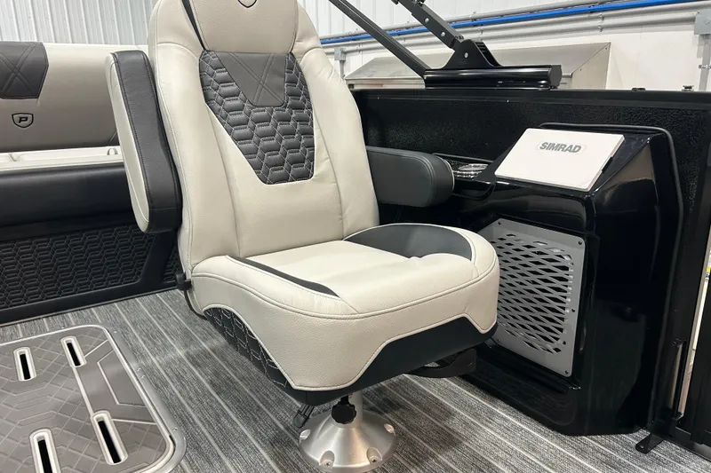 Slide: The Image of Luxurious seating in 2026 Premier 230 Intrigue GT RLO boat with Simrad system. - 24