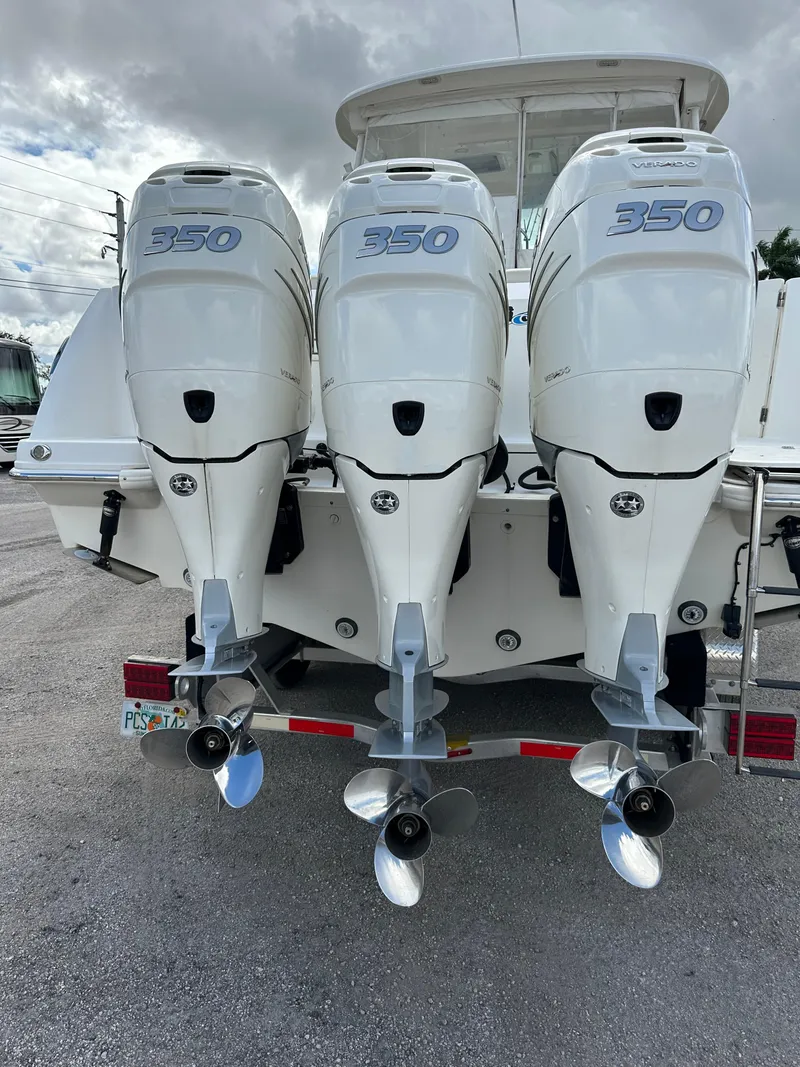 Slide: The Image of 2019 Boston Whaler 345 Conquest with triple 350 horsepower engines. - 6