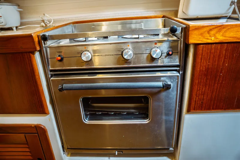 Slide: The Image of Stainless steel oven in 1994 Catalina 38 CC yacht kitchen. - 28