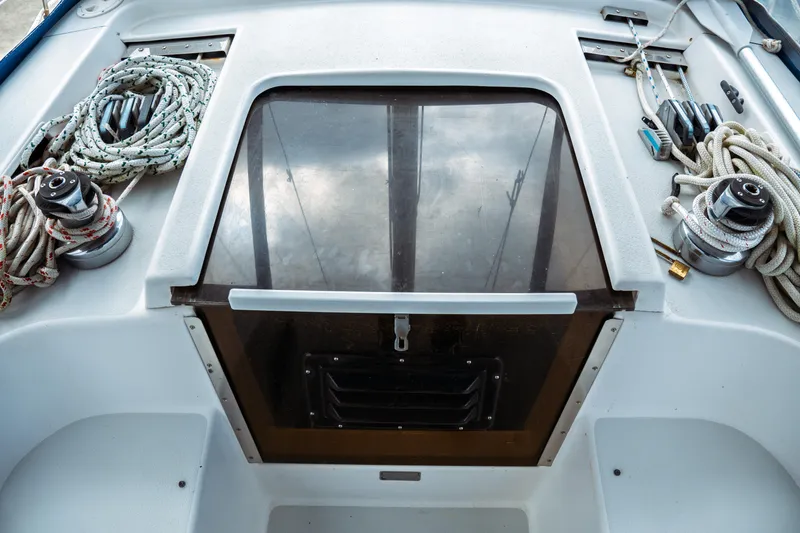 Slide: The Image of 1994 Catalina 38 CC sailboat cockpit with ropes and winches. - 7
