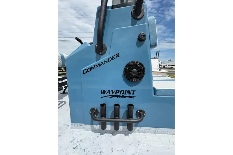 Slide: The Image of 2026 Freedom Boats 21' Commander, blue exterior with "Waypoint Marine" branding. - 7