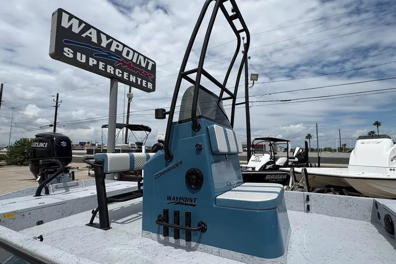 Slide: The Image of 2026 Freedom Boats 21' Commander at Waypoint Marine Supercenter, featuring sleek design and modern amenities. - 9